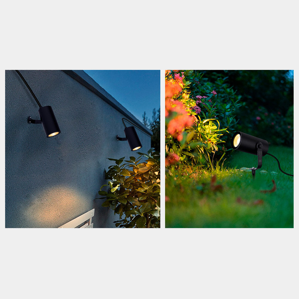 Zigbee RGB CCT LED-puutarhavalaisin asennettuna seinälle ja puutarhaan, luoden moniväristä valoa.