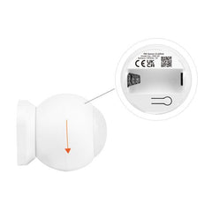 PIR liiketunnistin 2.4G sensorin käyttöohje ja takakansi, jossa näkyy paristokotelo.